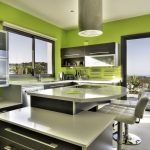 Modern green kitchen with ocean view